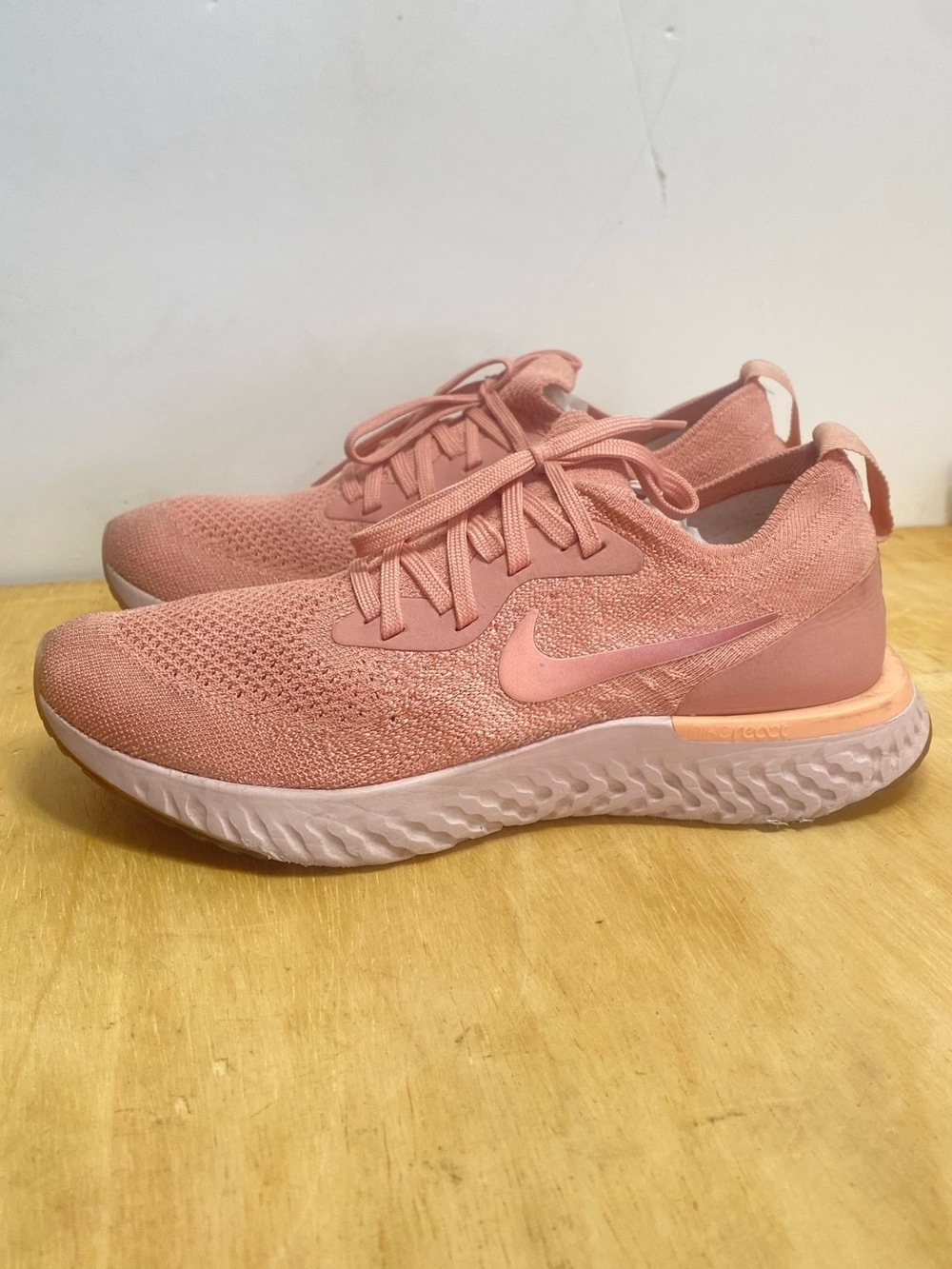 Nike Women's Pink Flyknit Running Sneakers